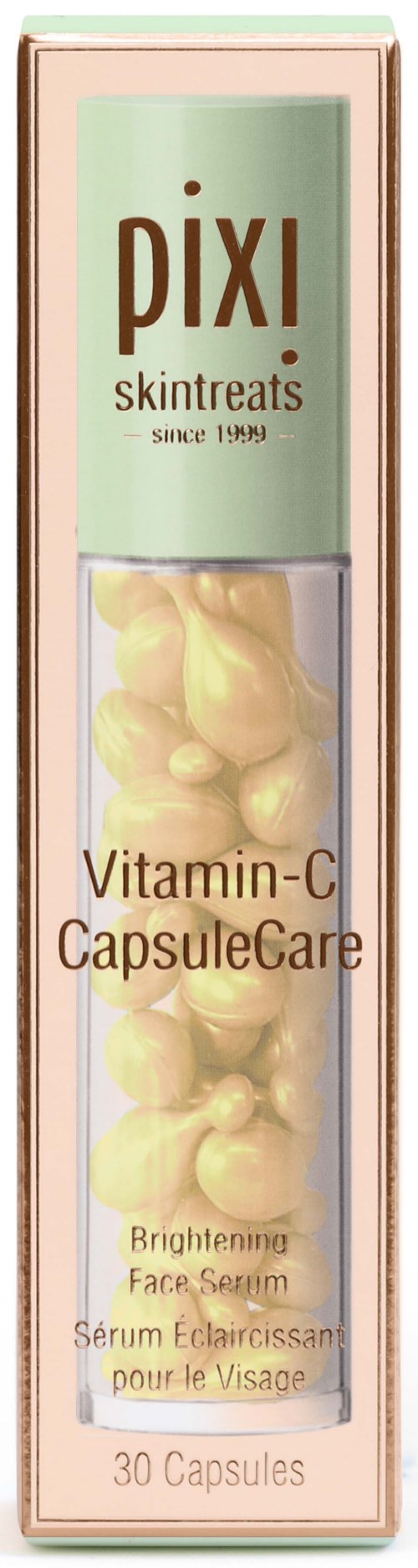 Een doosje Pixi Skintreats Vitamin-C CapsuleCare voor het verhelderen van het gezicht, met 30 capsules met gele inhoud.