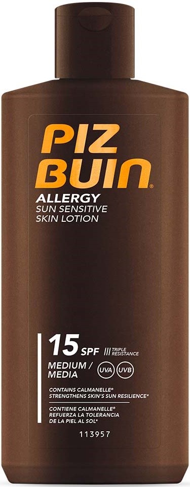 A brown bottle of Piz Buin sunscreen with SPF 15, designed for sensitive skin and medium coverage.