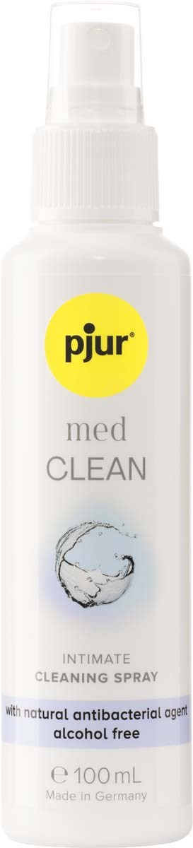 Eine weiße Sprühflasche von Pjur Med Clean mit gelbem Etikett, zeigt Wasserstrahl und Text über Reinigung und Bakterien.
