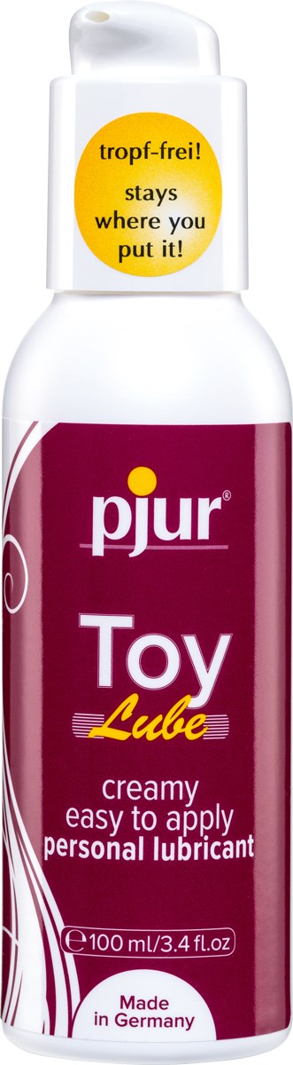 Eine weiße Flasche mit Pumpe, bezeichnet als Spielzeug-Gleitmittel, sagt, es ist cremig und leicht aufzutragen, hergestellt in Deutschland.