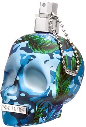 Een parfumfles met schedelontwerp, versierd met groene bladeren en een ketting aan de dop.