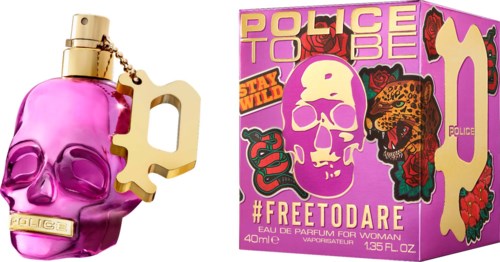 Roze schedelvormige parfumfles met gouden spray en gouden sleutelketting. Felroze doos met schedel, luipaard en rozen.