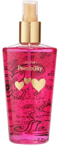 Roze parfumfles met gouden dop, versierd met harten en bloemen. Bevat parfum met label 'Passibility'.