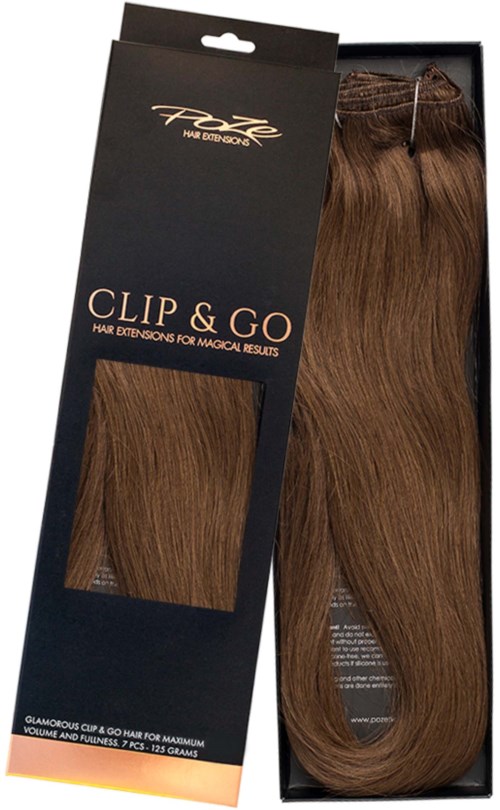 Een doos met bruin haar, gemerkt "Clip & Go" voor eenvoudige haarverlenging, op een zwarte achtergrond.