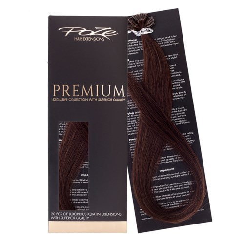 Ett paket med bruna hårförlängningar märkt "Premium" med 20 delar, gjorda av lyxigt keratin, på en svart bakgrund.