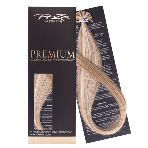 En låda med blonda hårförlängningar märkt 'Fate Hair Extensions Premium' med 20 stycken i.