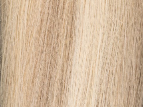 Blond haar met rechte textuur, close-up van haarstrengen.