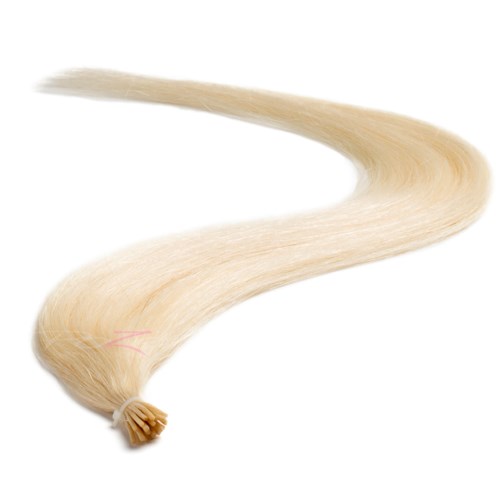 Lång, ljus-blond hårförlängning med liten klämma i änden.