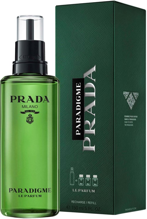 Prada Paradigme doftflaska i grönt med spray bredvid dess gröna förpackning.
