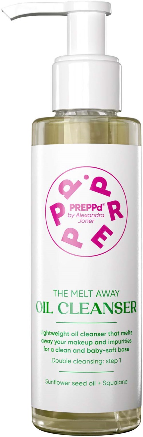 A transparent bottle with a pump contains an oil-based makeup remover with pink and green text, sunflower seed oil, and squaulin.