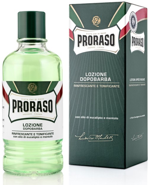 Pieni Proraso-jäljentappoliuos. Pullo on kirkas ja sisältää vihreää nestettä, ja kannu on tummanvihreä.
