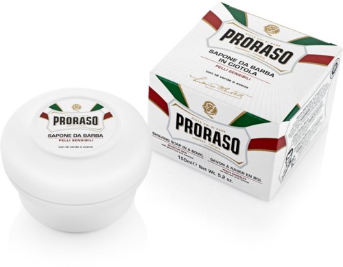 Valkoinen purkki ja Proraso-sahanvaahdepakkaus herkälle iholle, vihreä, punainen ja valkoinen pakkaussuunnittelu.