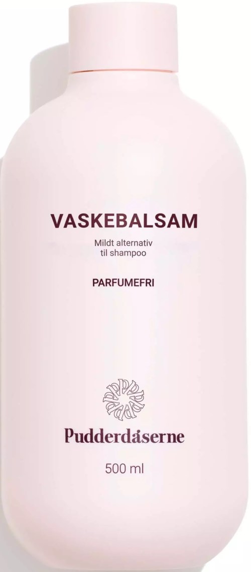 En hvit flaske med rosa lokk merket på dansk som vaske krem, mild for sjampo, parfymefri, 500 ml.