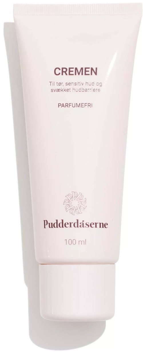 Hellrosa Tube mit Cremem für empfindliche Haut, mit Blumenmuster, enthält 100 ml Creme.