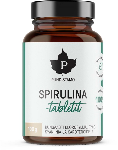 Ruskeavalo, spirulina-tabletteja, valkoinen etiketti, jossa vihreää tekstiä ja musta lehti.