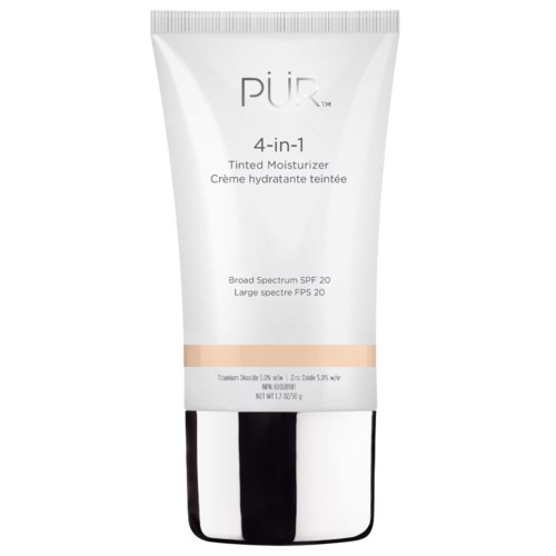 En vit tub med SPF 20, märkt 'PÜR 4-i-1', med beige och svart design.