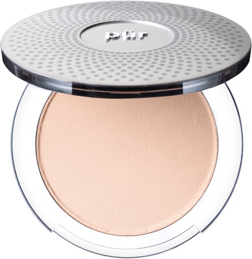 Koko meikkipuuteri, jossa pyöreä hopeinen kansi ja vaalean beige jauhe sisällä.