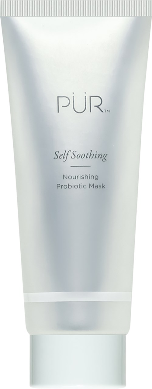 En vit tub med hudvårdsprodukt märkt 'PUR', 'Self Soothing Nourishing Probiotic Mask'.