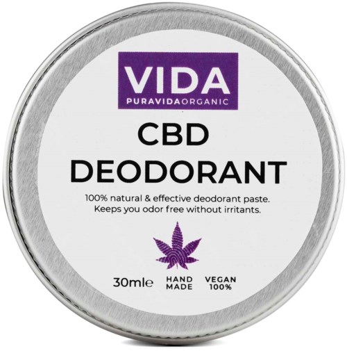 Een ronde container met een paarse, witte en zwarte label. Het zegt 'VIDA CBD DEODORANT' en heeft een paarse cannabisplant.