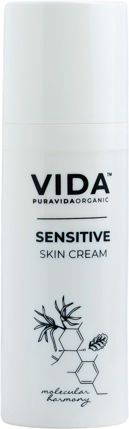 Witte fles met VIDA Sensitive Skin Cream met eenvoudige zwarte tekst en een kleine illustratie van moleculen.