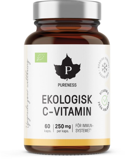 A brown bottle of vegan vitamin C supplement with a white label showing green and black text and symbols.