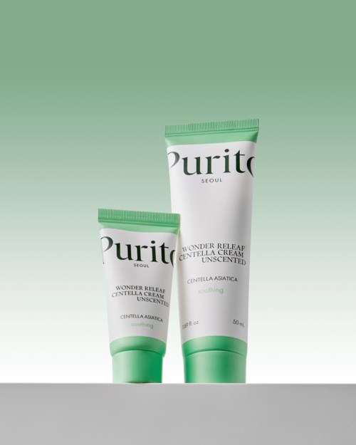 Two tubes of Purito Wonder Releaf Centella Cream, one large and one small, against a green and white background.