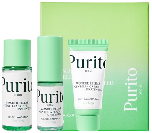 Een huidverzorgingsset met flessen en een tube, allemaal met Purito erop, voor een groene doos.