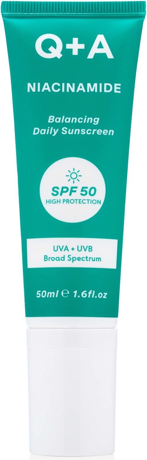 A green and white tube labeled Q+A Niacinamide balancing sunscreen with SPF 50, broad spectrum protection, and 50ml size.
