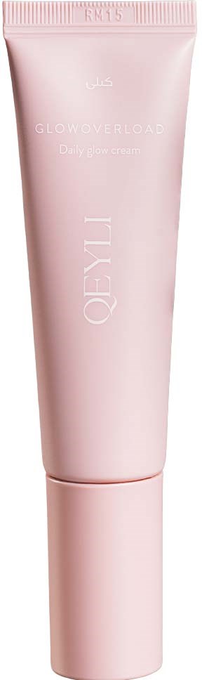 En ljusrosa tub med hudvårdsprodukt med vridlock, märkt OYUL Glow & Shine Daily Glow Cream.