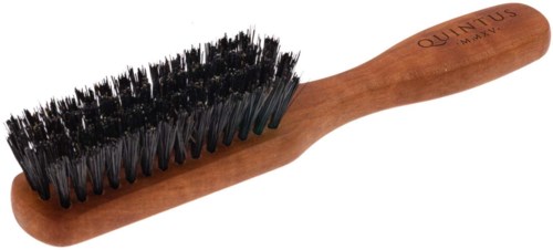 A wooden-handled brush with black bristles, used for cleaning shoes or polishing leather.