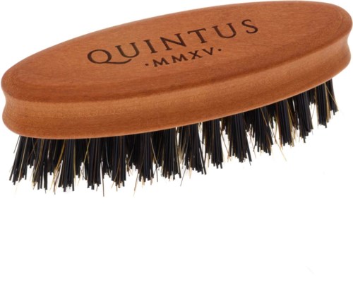 A wooden shoe brush with black bristles and the text 'QUINTUS MMXV' engraved on it.