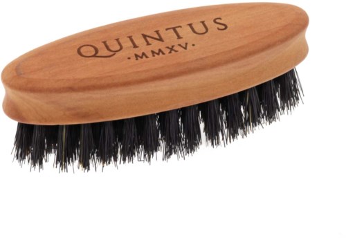 A wooden shoe brush with black bristles and the word 'QUINTUS' engraved on it.