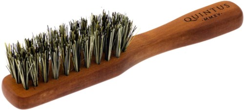 A wooden shoe polish brush with metal bristles, labeled 'QUINTUS MMXV' on the handle.