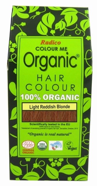 Groene verpakking met zwarte en gele accenten, bevat haarverf gemarkeerd als biologisch, licht roodgeel blond.