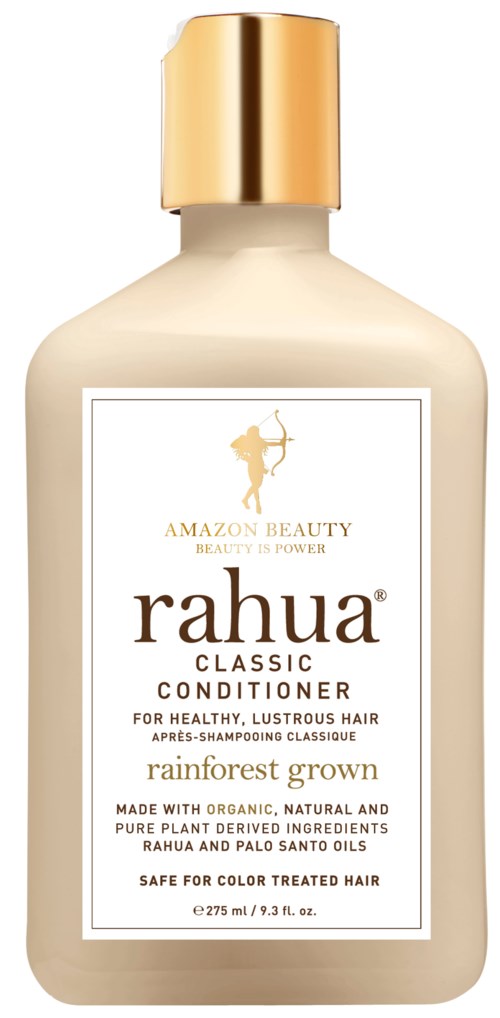 A bottle of Rahua Classic Conditioner, with a white label, gold cap, and text about hair care and organic ingredients.