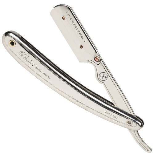 A straight razor with a white handle and shiny silver blade, marked with 'Stainless Steel' and 'Since 1973'.