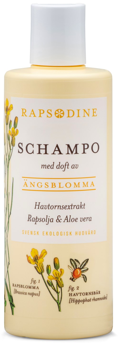 A shampoo bottle with a white cap, yellowish body, and floral illustrations, labeled as apple blossom-scented with herbal extracts.