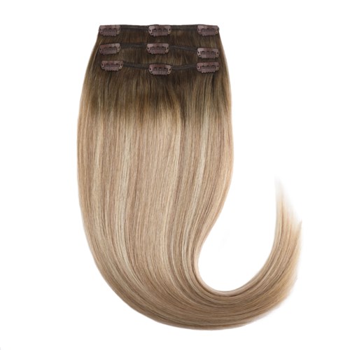 Hair extensions with clips in a light blonde color, curled at the end. They are arranged in four bands.