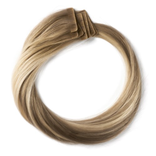Blonde hair styled with a brown hair scrunchie in a circular shape.