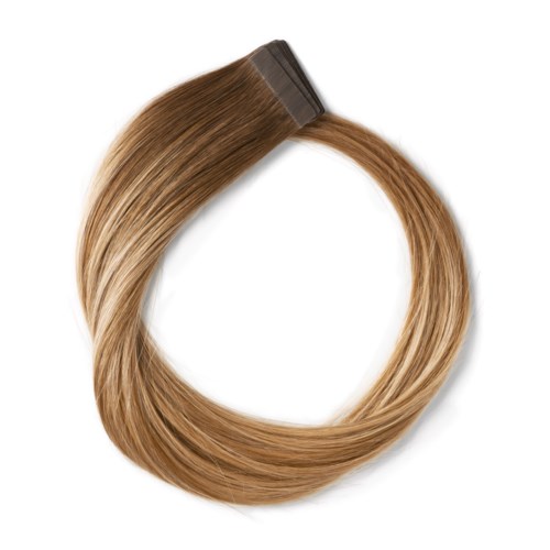 En hårförlängningsspiral med klämma, gjord av rakt brunt hår.