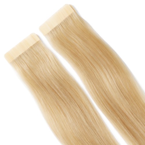 Två buntar av långt, rakt, blond hårförlängning med beige toppar.