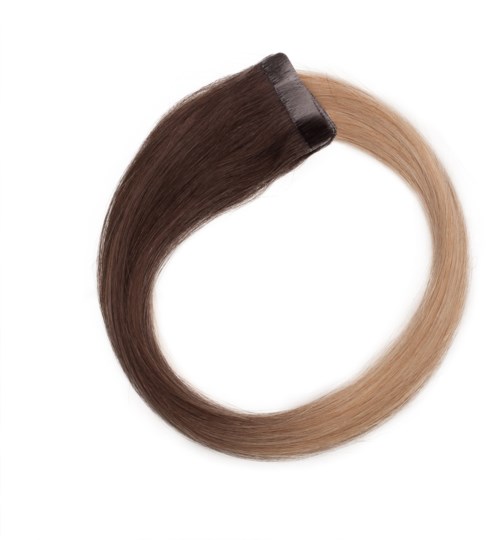 En hårförlängning eller färgring som visar mörkbrunt som smälter in i blont. Den är formad som en cirkel på en vit bakgrund.