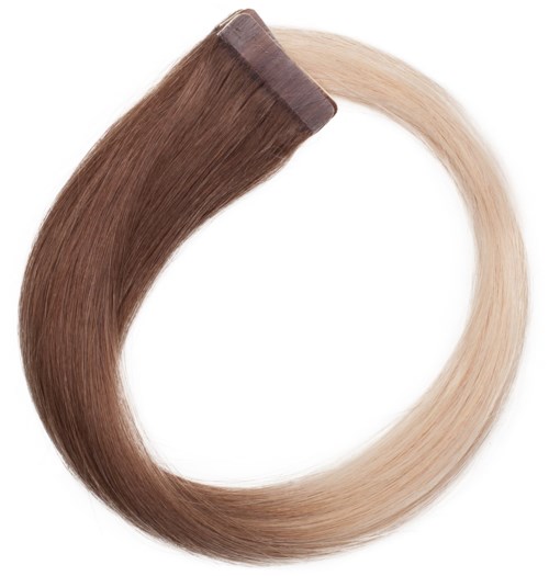 Ett hårfärgsprov visar mörkbrunt som övergår i blont.