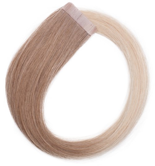 Ett hårförlängningspaket med brunt på ena sidan och blont på den andra, formad som en cirkel.