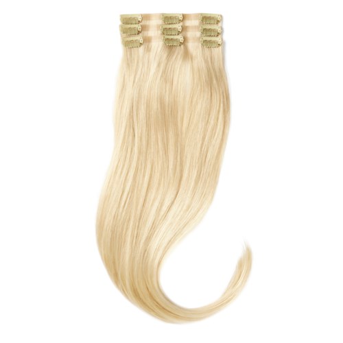 Blonde hair extensions with four clips for attachment. They are shiny and smooth.