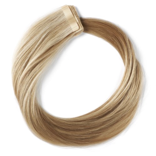 Een ring van blond haar, donkerder aan één kant, netjes in een cirkel. 