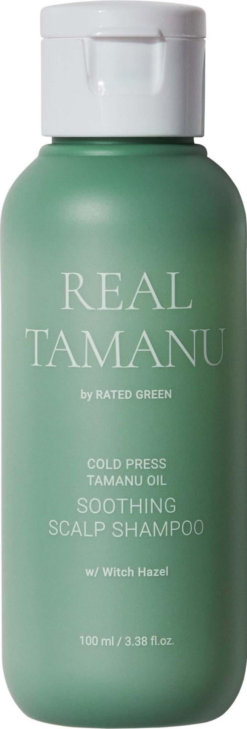Groene shampoo fles met wit deksel, gelabeld Real Tamanu, voor rustgevende hoofdhuid met toverhazelaar.