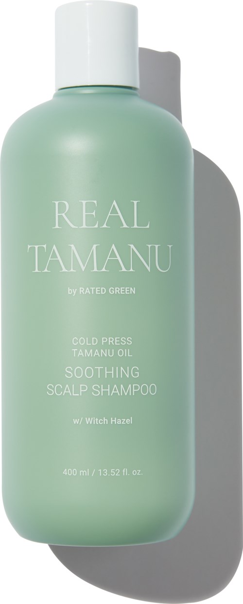 A light green shampoo bottle with a white cap, labeled 'Real Tamanu' and 'Soothing Scalp Shampoo' for hair care.