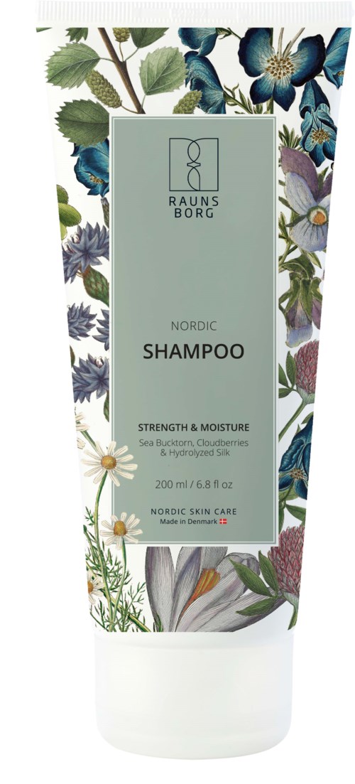 Eine Shampoo-Flasche mit der Aufschrift 'Raunsborg Nordic Shampoo' und Blumen- und Pflanzenillustrationen.