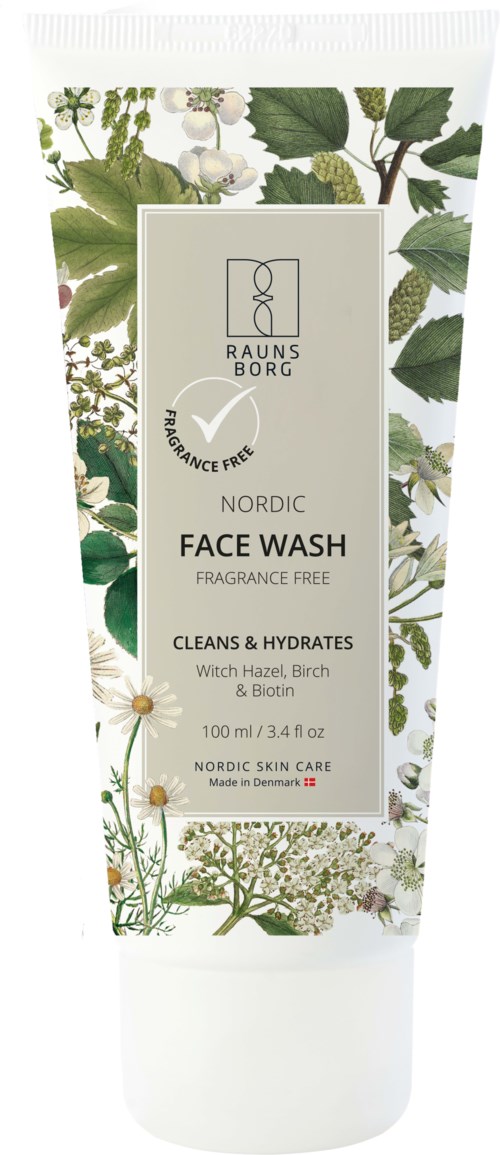 Weiße Tube mit Gesichtsreiniger, grünen Blättern und Kräutern, beschriftet 'Raunsborg Nordic Face Wash,' parfumfrei, 100ml.